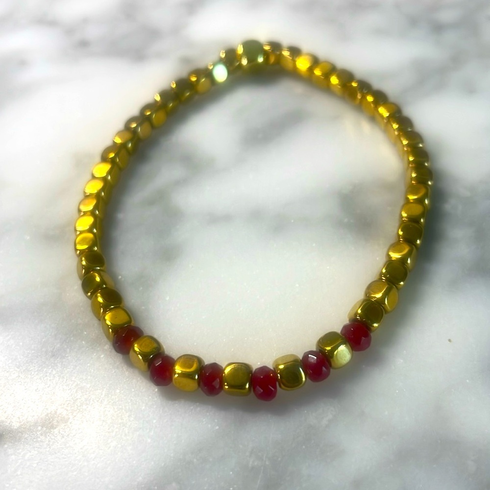 Cubed hematite with ruby bracelet size 7”